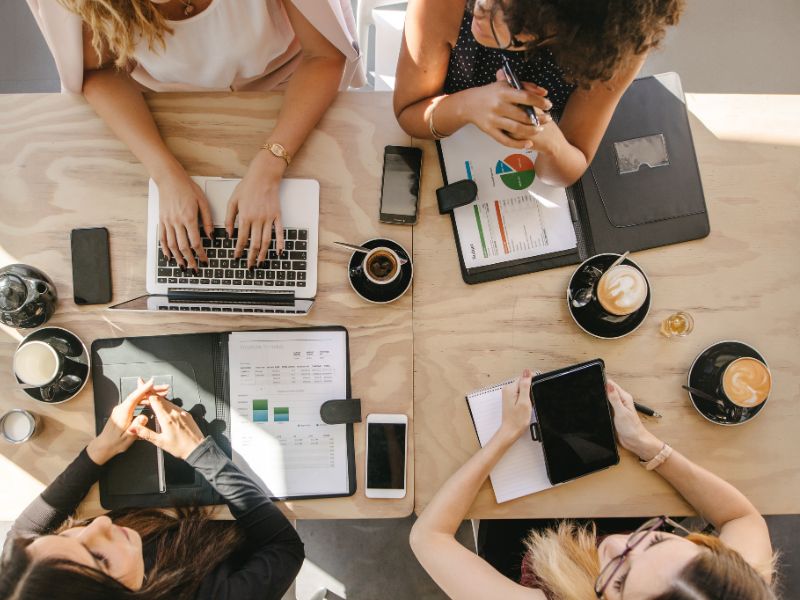 marketing team sitting at a table